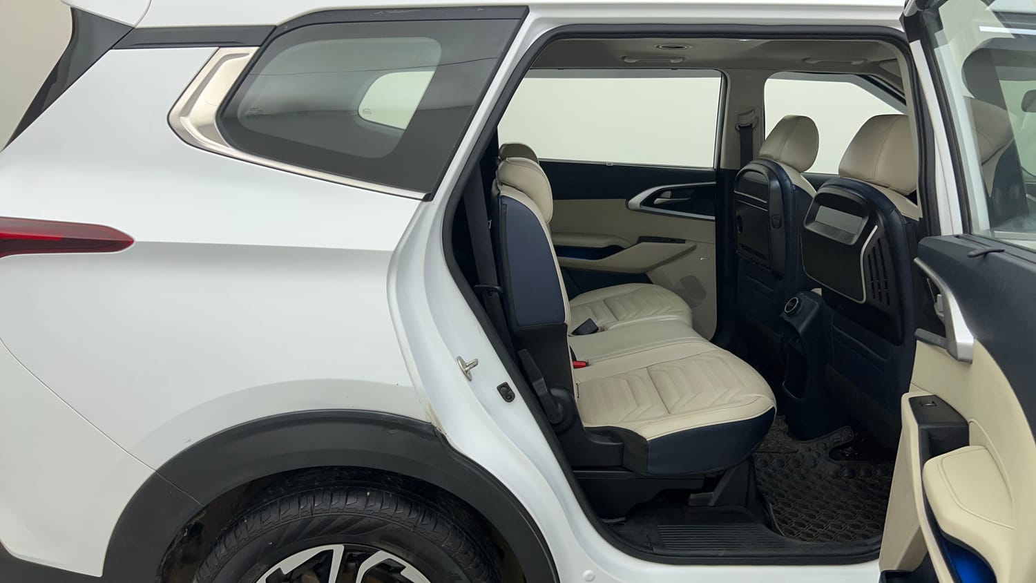 Used 2022 Kia Carens Luxury Plus 1.4 Petrol 7 STR Petrol Manual interior RIGHT SIDE REAR DOOR CABIN VIEW