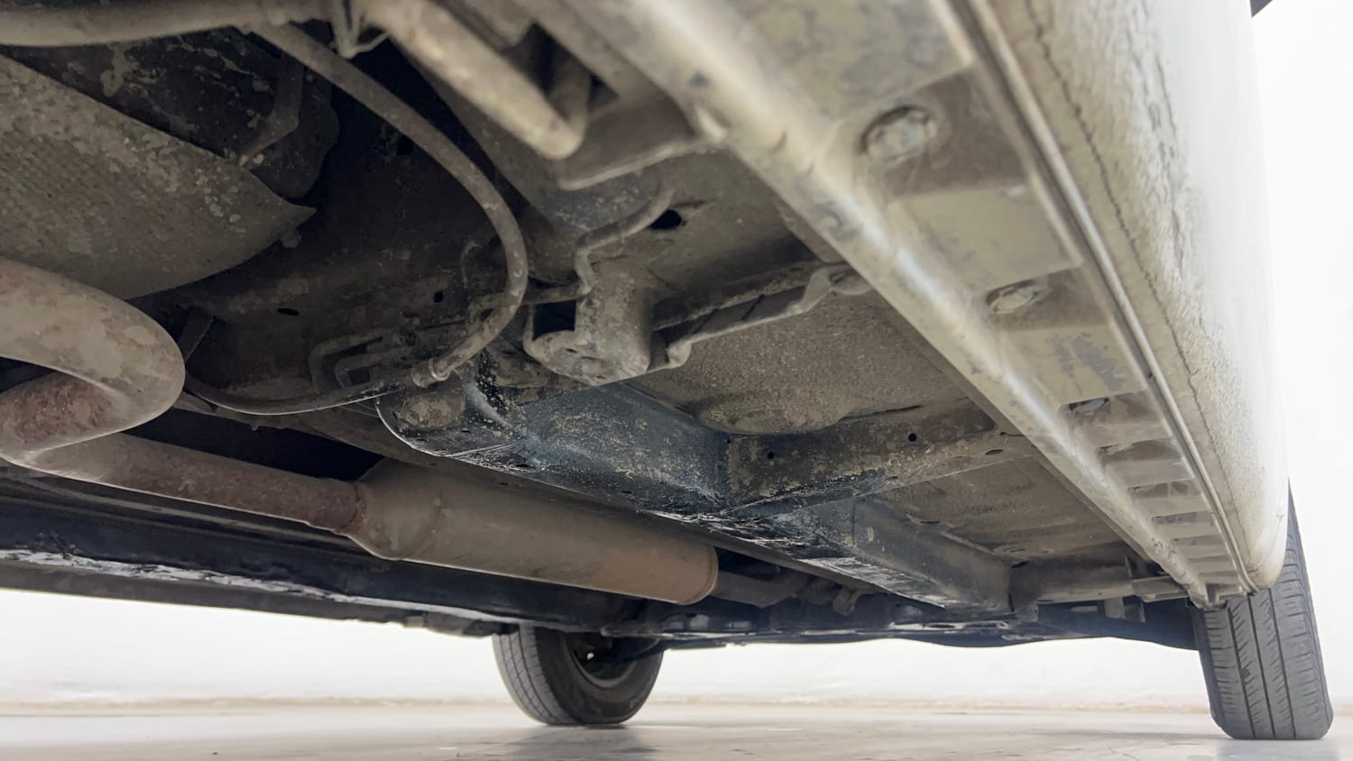Used 2012 Maruti Suzuki Swift Dzire LXI Petrol Manual extra REAR RIGHT UNDERBODY VIEW