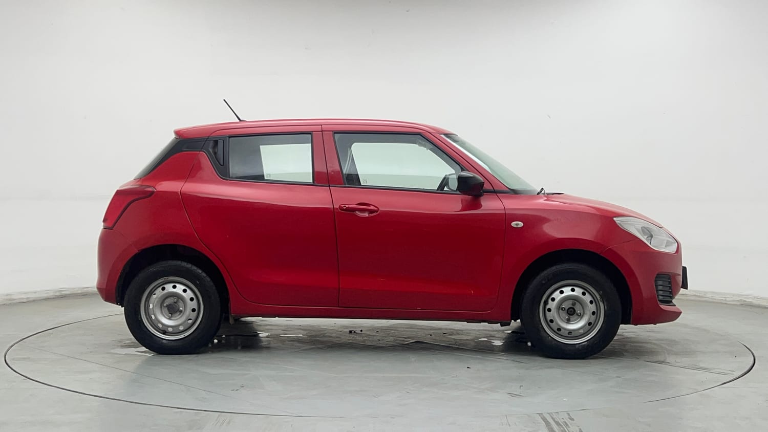 Used 2022 Maruti Suzuki Swift LXi Petrol Manual exterior RIGHT SIDE VIEW