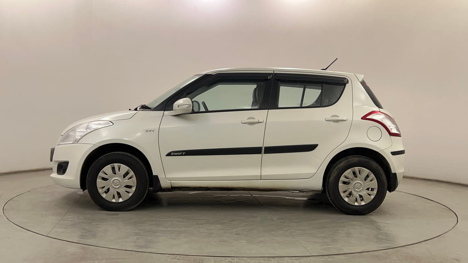 Used 2013 Maruti Suzuki Swift VXi Petrol Manual exterior LEFT SIDE VIEW