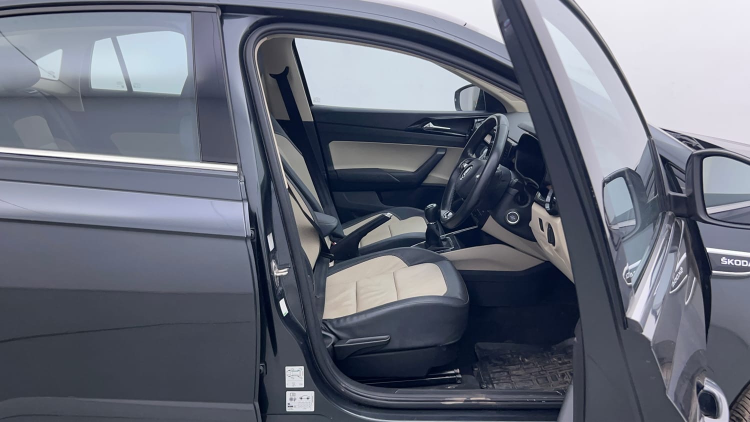 Used 2023 Skoda Slavia Style 1.0L TSI MT Petrol Manual interior RIGHT SIDE FRONT DOOR CABIN VIEW