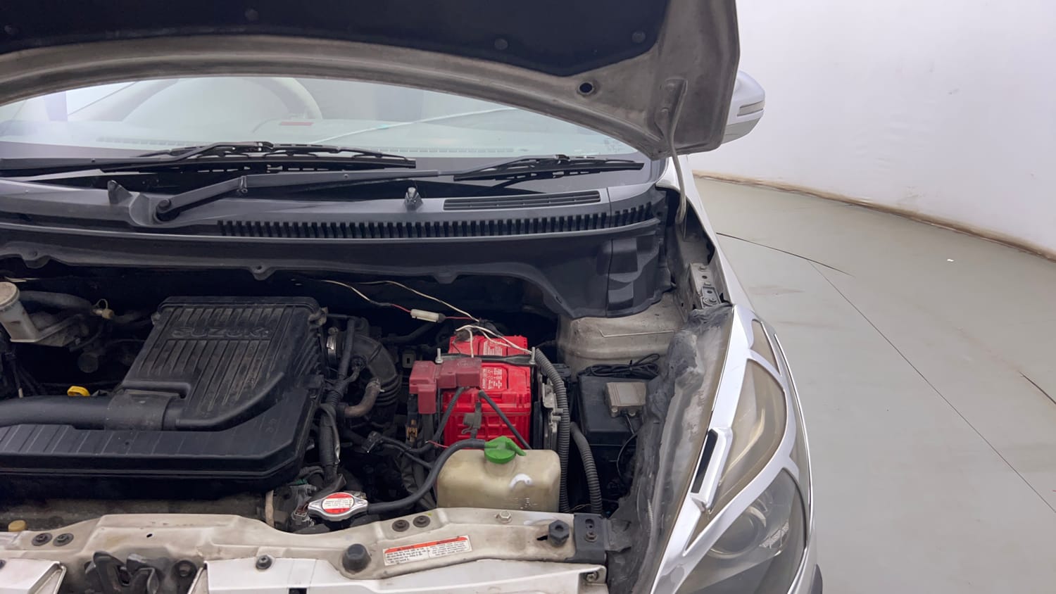 Used 2014 Maruti Suzuki Ertiga ZXi Petrol Manual engine ENGINE LEFT SIDE HINGE & APRON VIEW