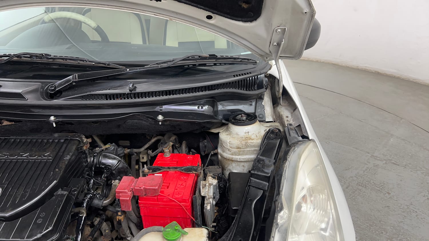 Used 2012 Maruti Suzuki Swift Dzire LXI Petrol Manual engine ENGINE LEFT SIDE HINGE & APRON VIEW