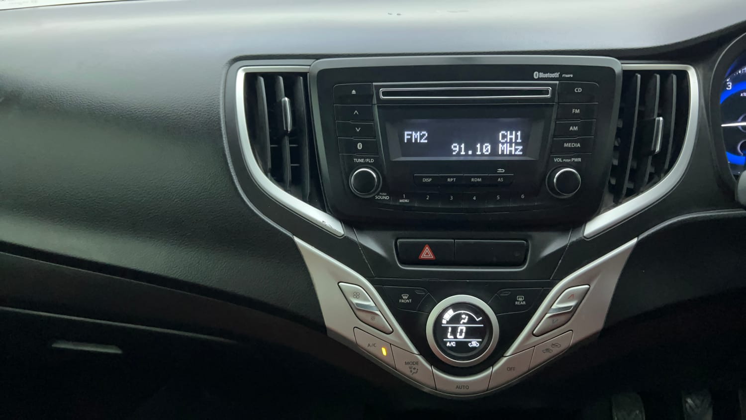 Used 2016 Maruti Suzuki Baleno Zeta 1.2 Petrol Manual interior MUSIC SYSTEM & AC CONTROL VIEW