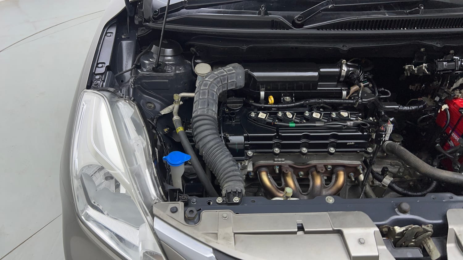 Used 2021 Maruti Suzuki Baleno Sigma Petrol Manual engine ENGINE RIGHT SIDE VIEW