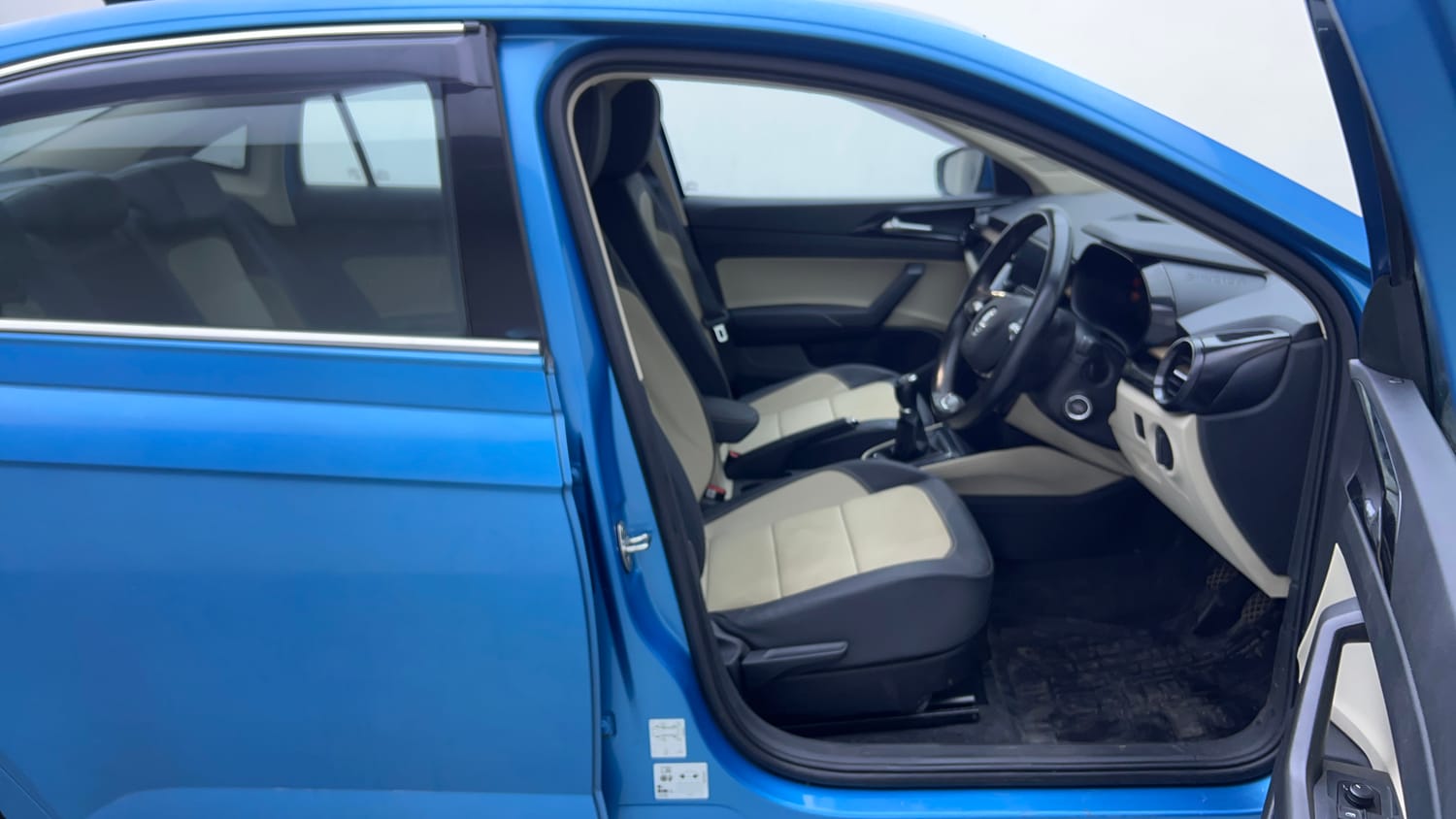 Used 2022 Skoda Slavia Style 1.0L TSI MT Petrol Manual interior RIGHT SIDE FRONT DOOR CABIN VIEW