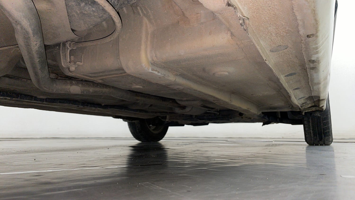 Used 2015 Hyundai Grand i10 Asta 1.2 Kappa VTVT (O) Petrol Manual extra REAR RIGHT UNDERBODY VIEW