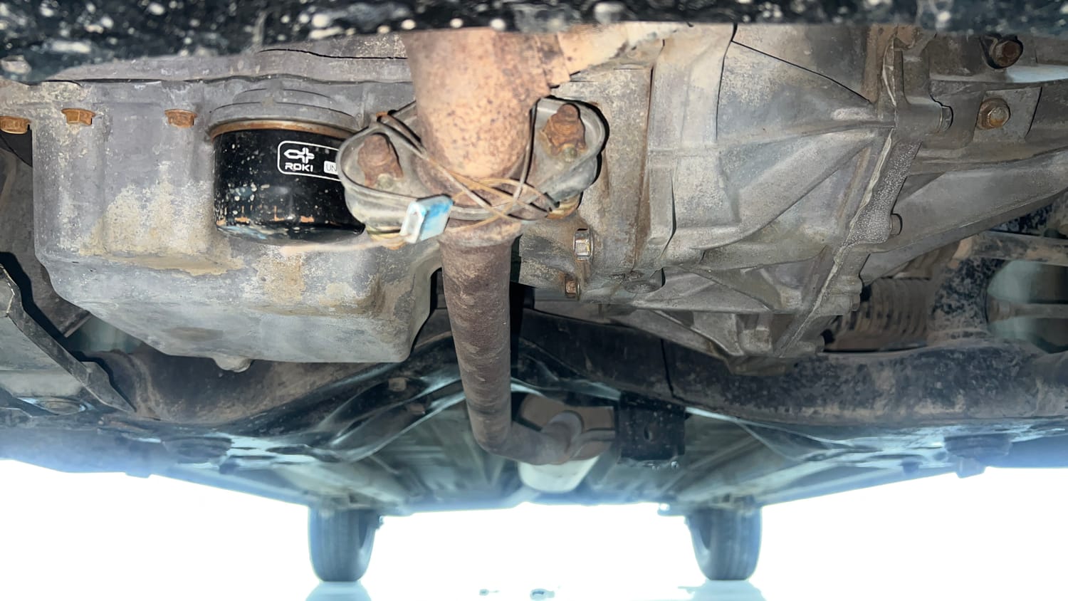 Used 2014 Maruti Suzuki Celerio VXi AMT Petrol Automatic extra FRONT LEFT UNDERBODY VIEW