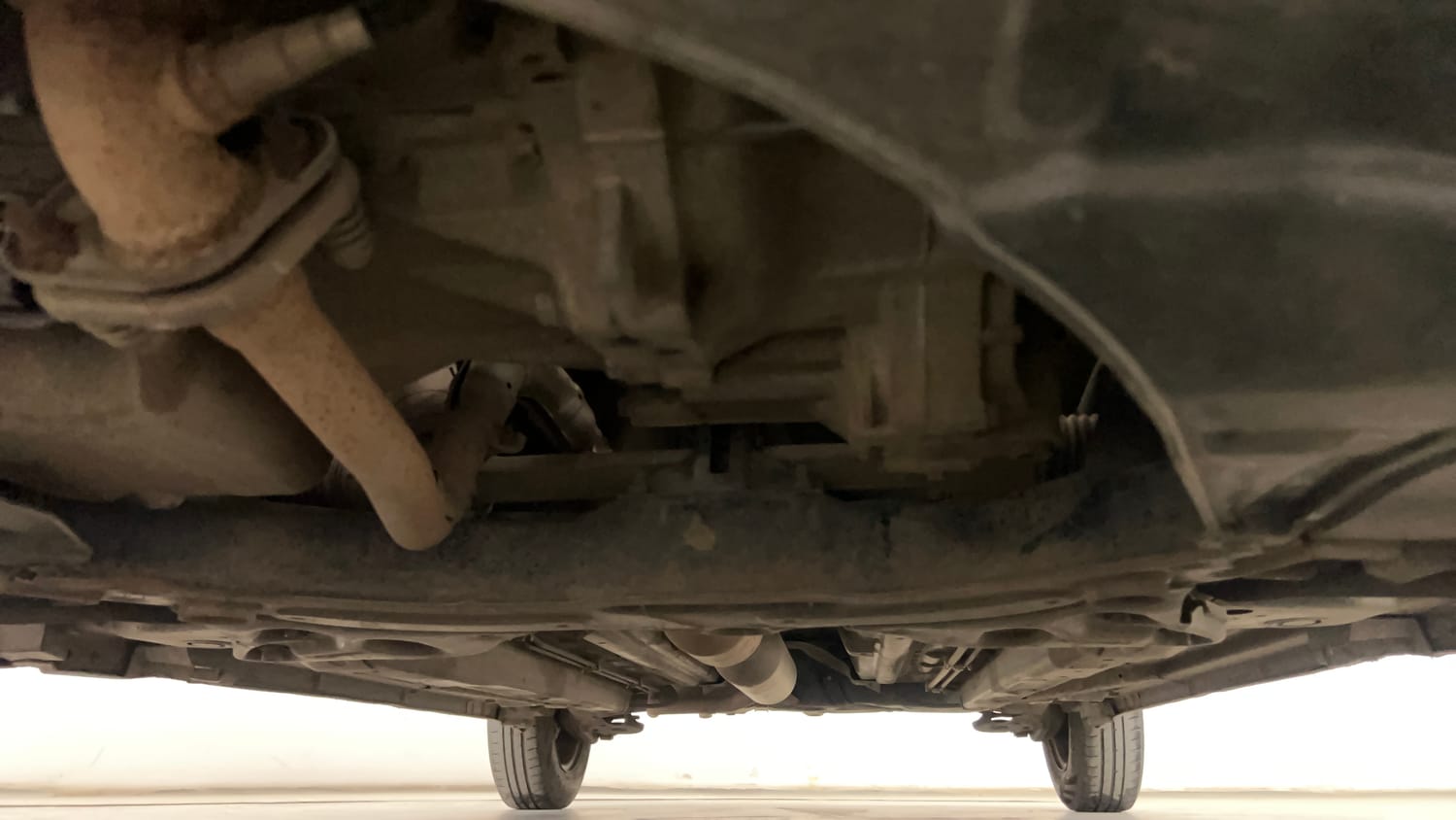 Used 2015 Maruti Suzuki Swift Dzire VXI Petrol Manual extra FRONT LEFT UNDERBODY VIEW