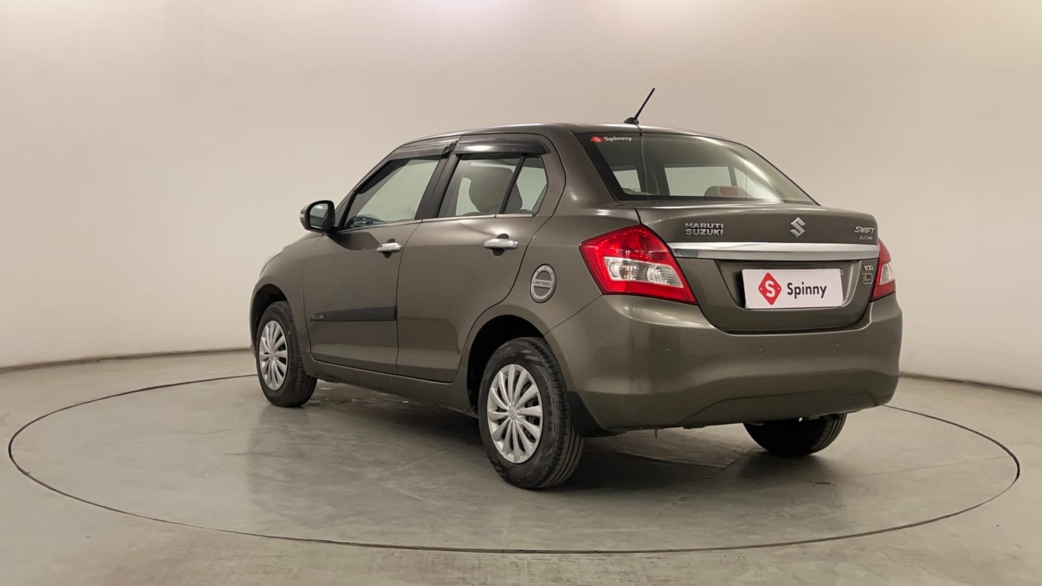 Used 2015 Maruti Suzuki Swift Dzire VXI Petrol Manual exterior LEFT REAR CORNER VIEW