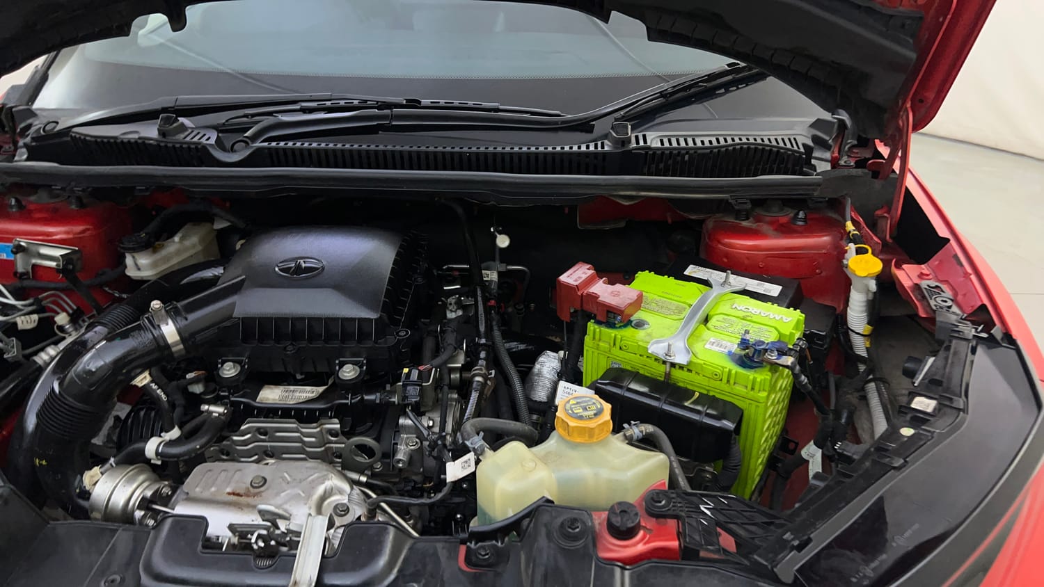 Used 2023 Tata Nexon Fearless Plus S 1.2 Revotron Petrol 7DCA DT Petrol Automatic engine ENGINE LEFT SIDE HINGE & APRON VIEW