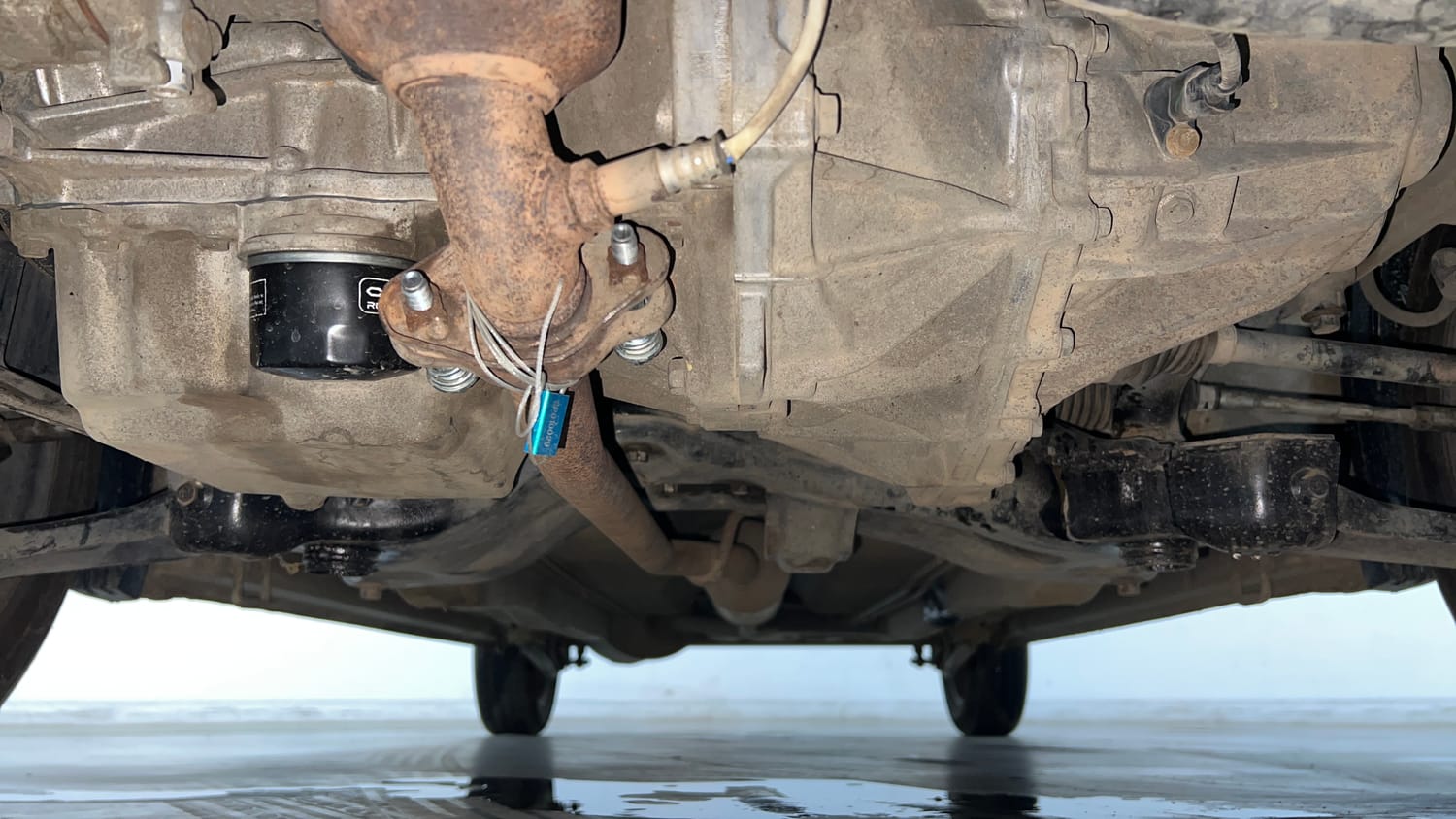 Used 2015 Maruti Suzuki Wagon R 1.0 VXI AMT Petrol Automatic extra FRONT LEFT UNDERBODY VIEW
