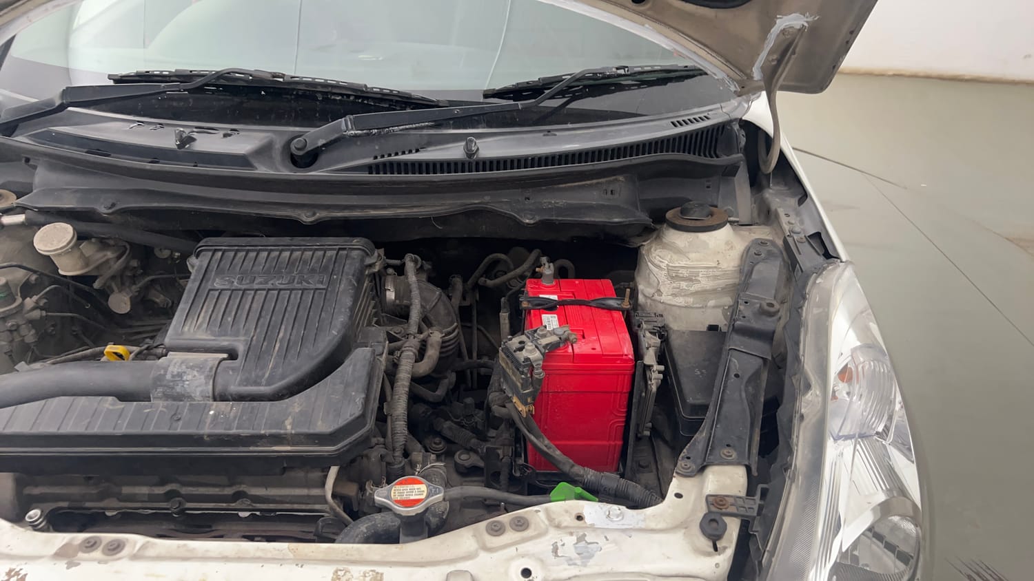 Used 2015 Maruti Suzuki Swift VXi Petrol Manual engine ENGINE LEFT SIDE HINGE & APRON VIEW