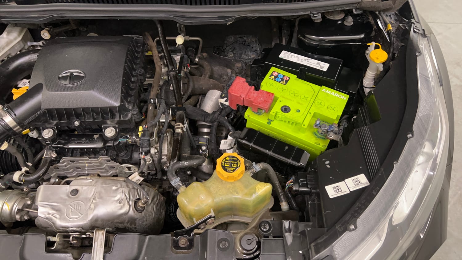 Used 2022 Tata Nexon XZA Plus (HS) Dark Edition Petrol Automatic engine ENGINE LEFT SIDE VIEW