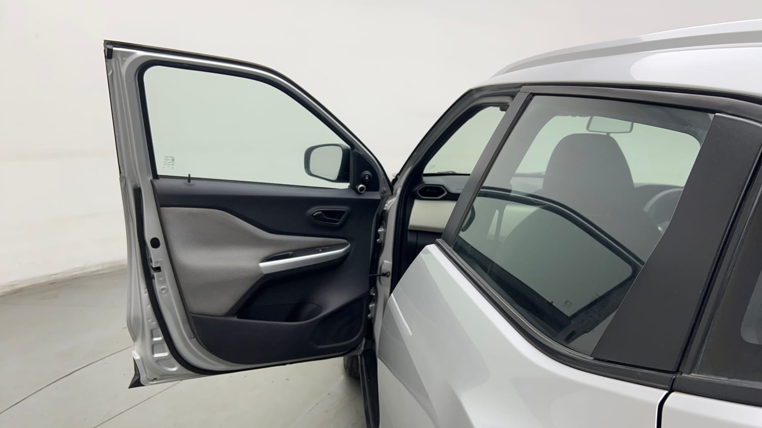 Used 2021 Nissan Magnite XE Petrol Manual interior LEFT FRONT DOOR OPEN VIEW