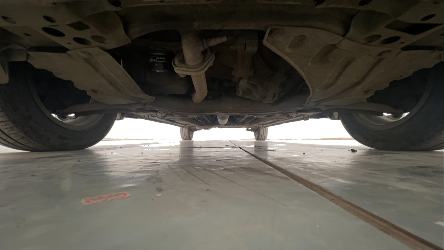 Used 2014 Maruti Suzuki Ertiga ZXi Petrol Manual extra FRONT LEFT UNDERBODY VIEW