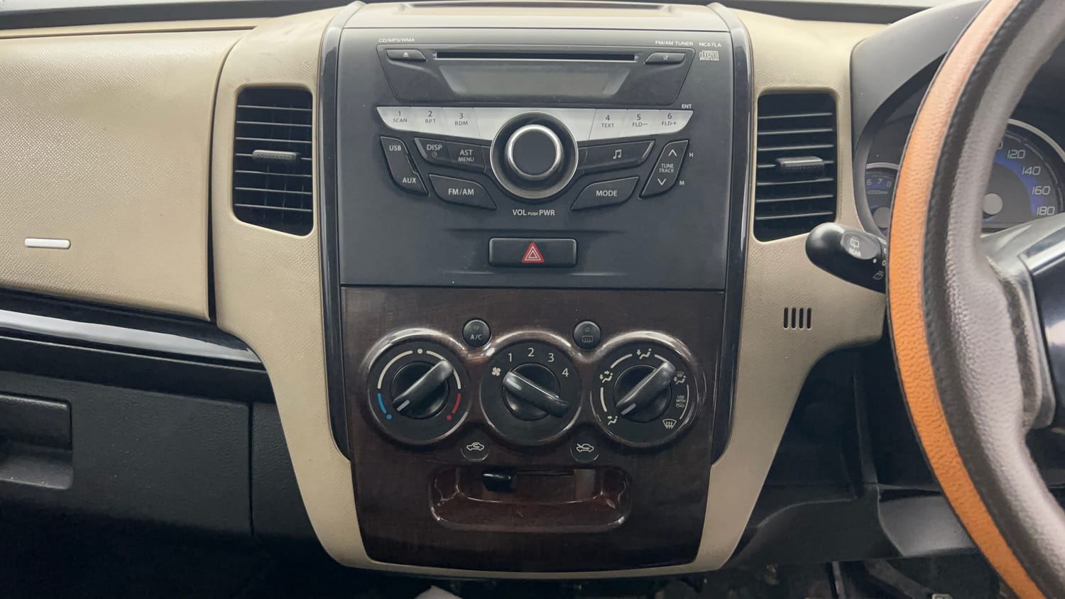 Used 2019 Maruti Suzuki Wagon R 1.0 VXI AMT Petrol Automatic top_features Integrated (in-dash) music system