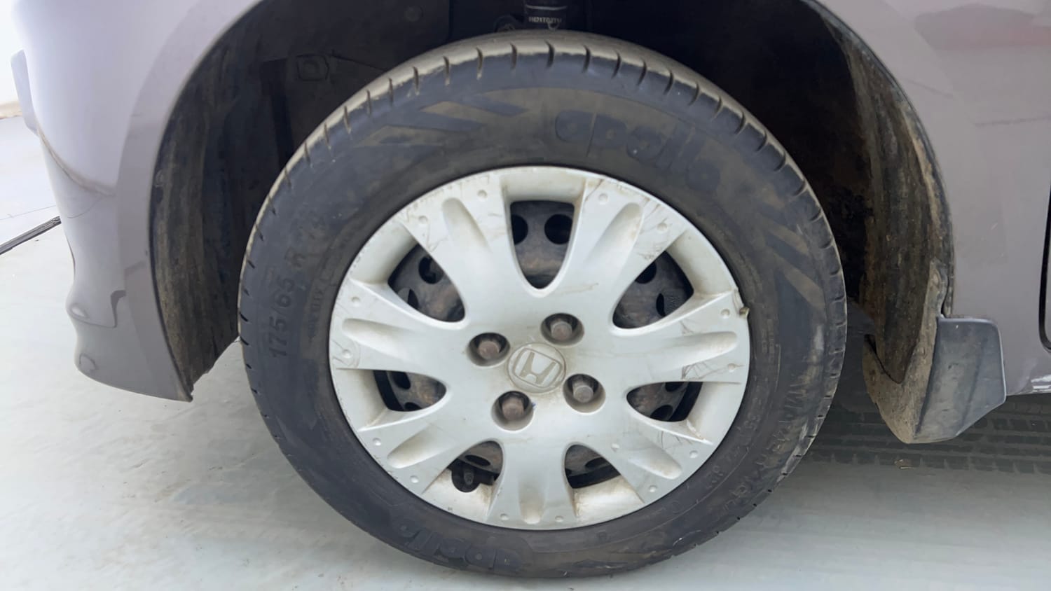Used 2014 Honda Brio S MT Petrol Manual tyres LEFT FRONT TYRE RIM VIEW