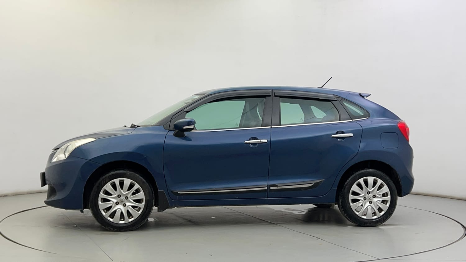 Used 2016 Maruti Suzuki Baleno Zeta 1.2 Petrol Manual exterior LEFT SIDE VIEW