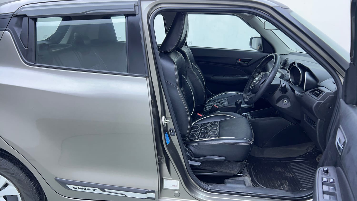 Used 2022 Maruti Suzuki Swift VXi Petrol Manual interior RIGHT SIDE FRONT DOOR CABIN VIEW