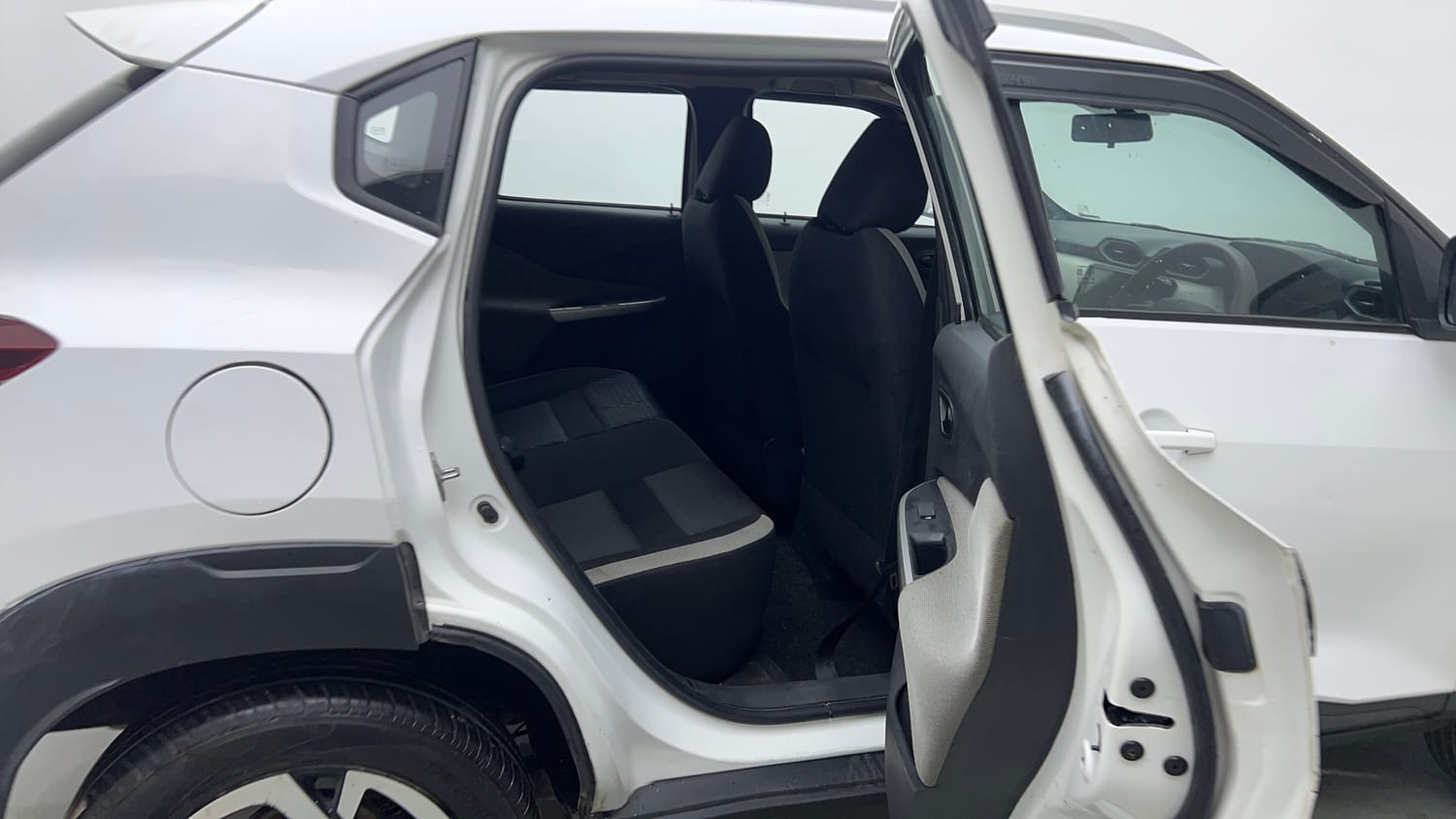 Used 2022 Nissan Magnite XE Petrol Manual interior RIGHT SIDE REAR DOOR CABIN VIEW