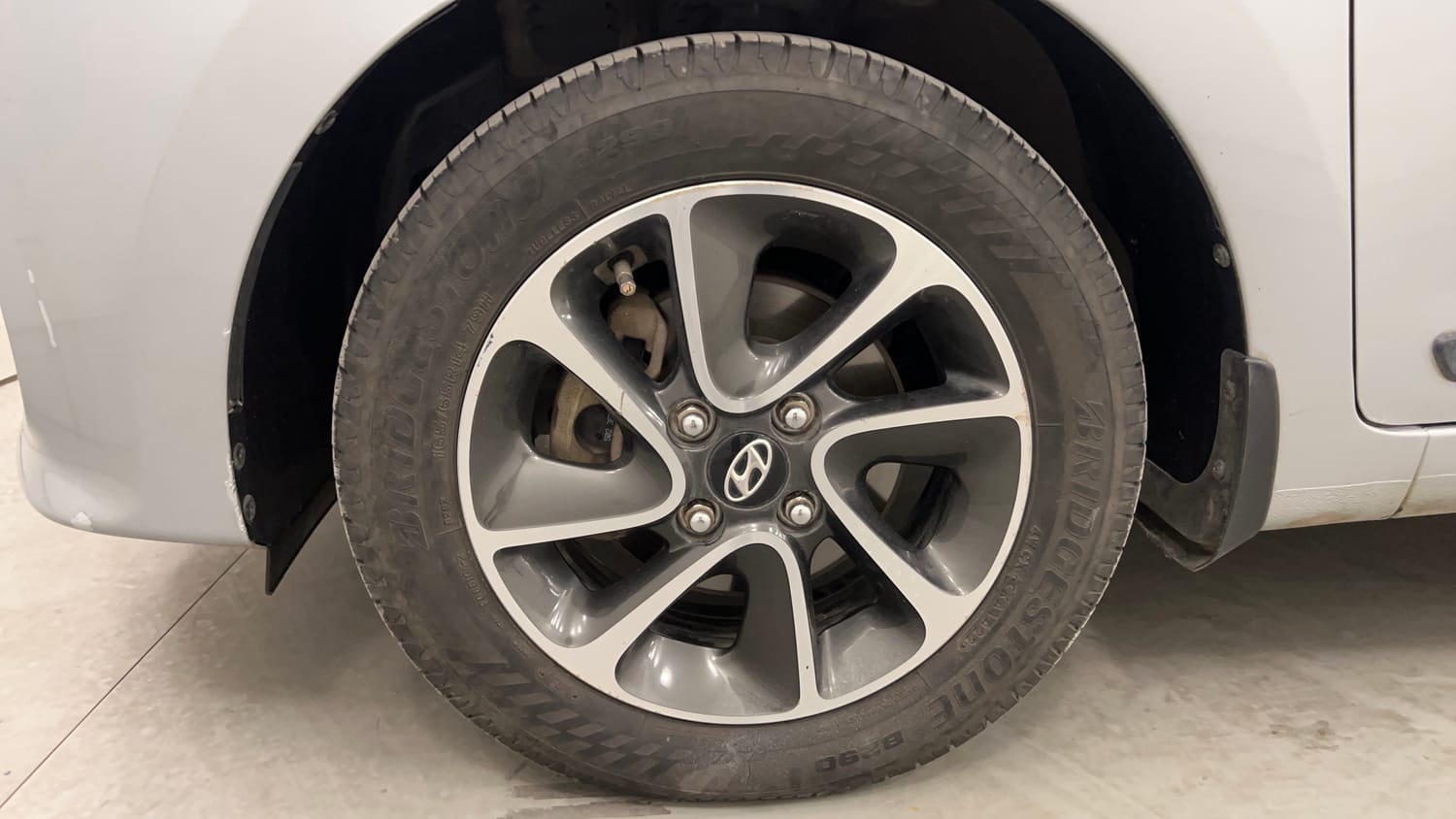 Used 2019 Hyundai Grand i10 Sportz AT 1.2 Kappa VTVT Petrol Automatic tyres LEFT FRONT TYRE RIM VIEW