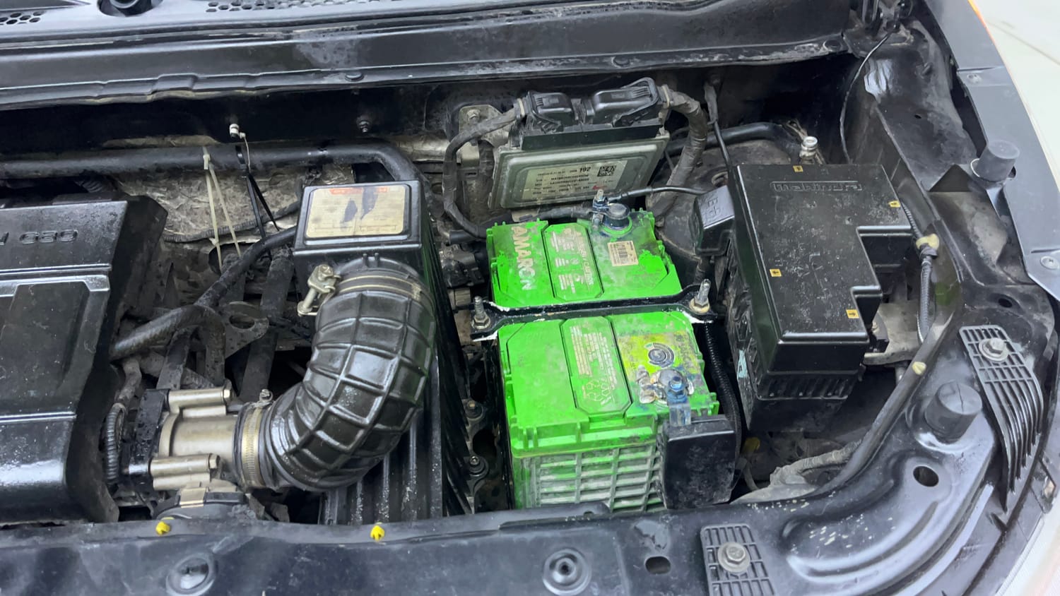 Used 2017 Mahindra KUV100 K6+ 5 STR Petrol Manual engine ENGINE LEFT SIDE VIEW