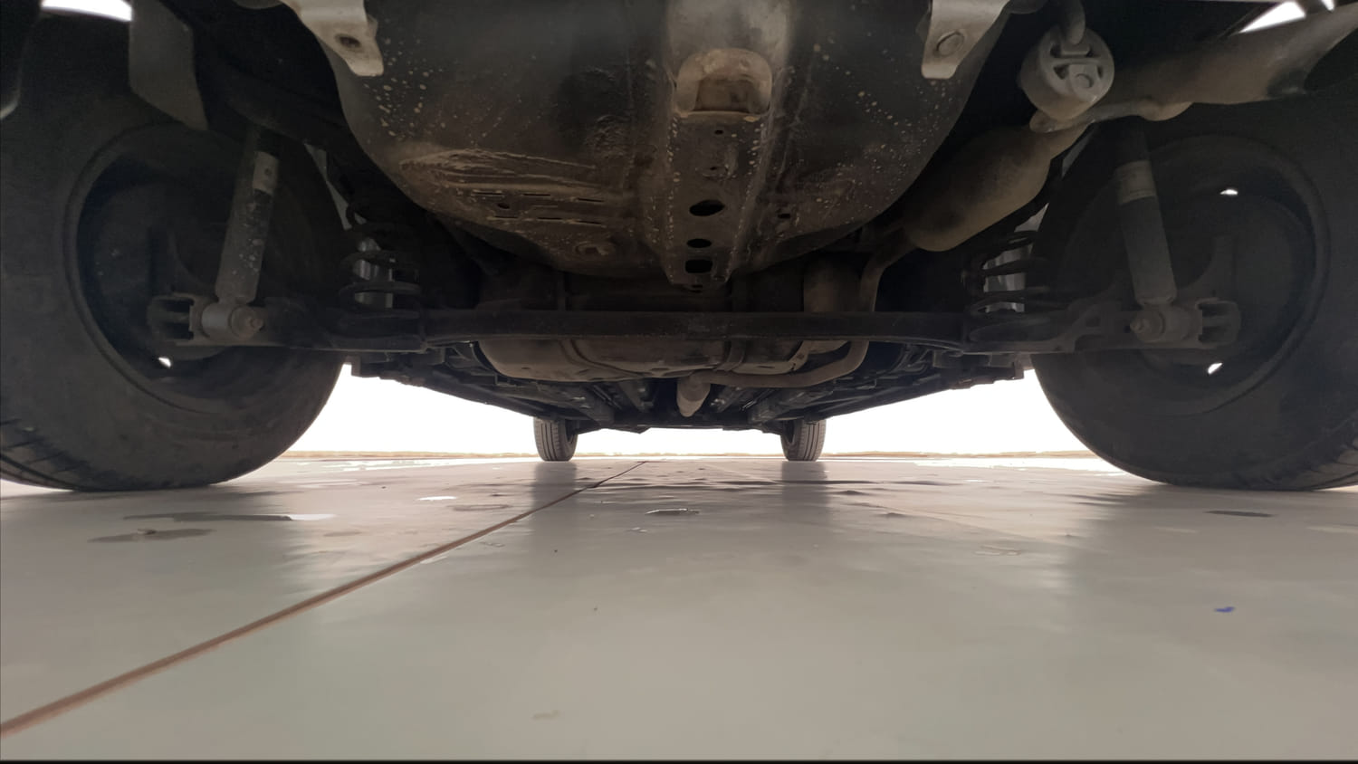 Used 2015 Maruti Suzuki Swift VXi Petrol Manual extra REAR UNDERBODY VIEW (TAKEN FROM REAR)