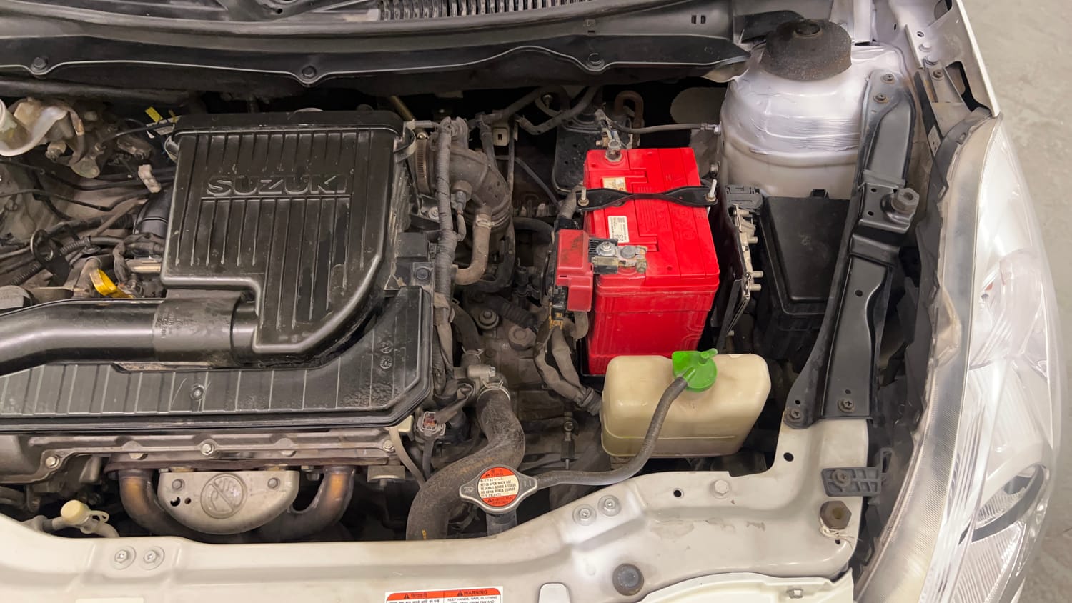 Used 2013 Maruti Suzuki Swift VXi Petrol Manual engine ENGINE LEFT SIDE VIEW