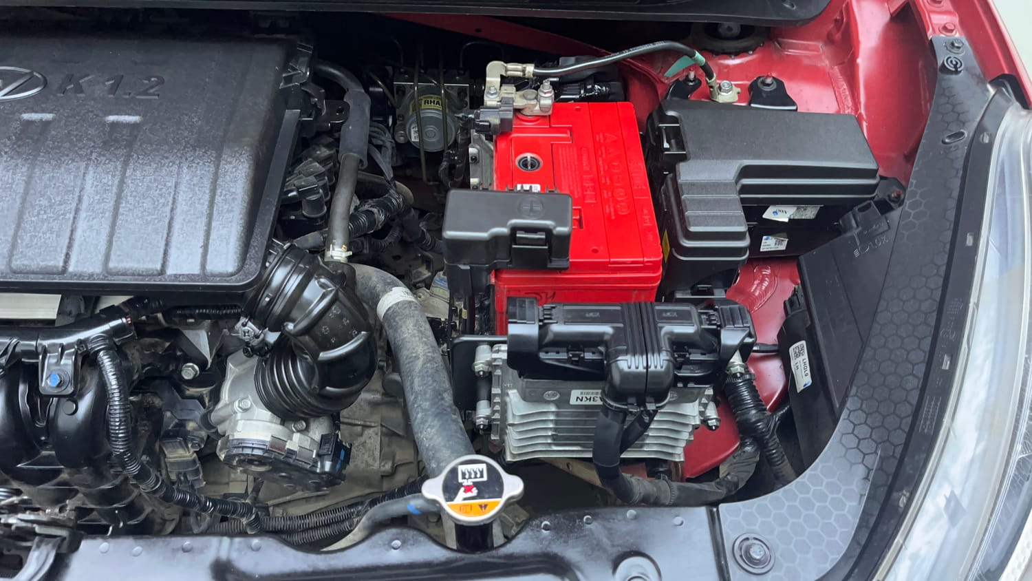 Used 2021 Hyundai Grand i10 Nios Sportz AMT 1.2 Kappa VTVT Petrol Automatic engine ENGINE LEFT SIDE VIEW