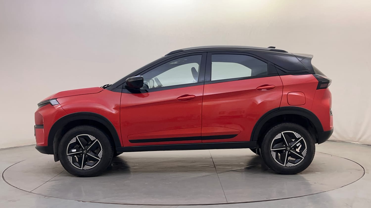Used 2023 Tata Nexon Fearless Plus S 1.2 Revotron Petrol 7DCA DT Petrol Automatic exterior LEFT SIDE VIEW