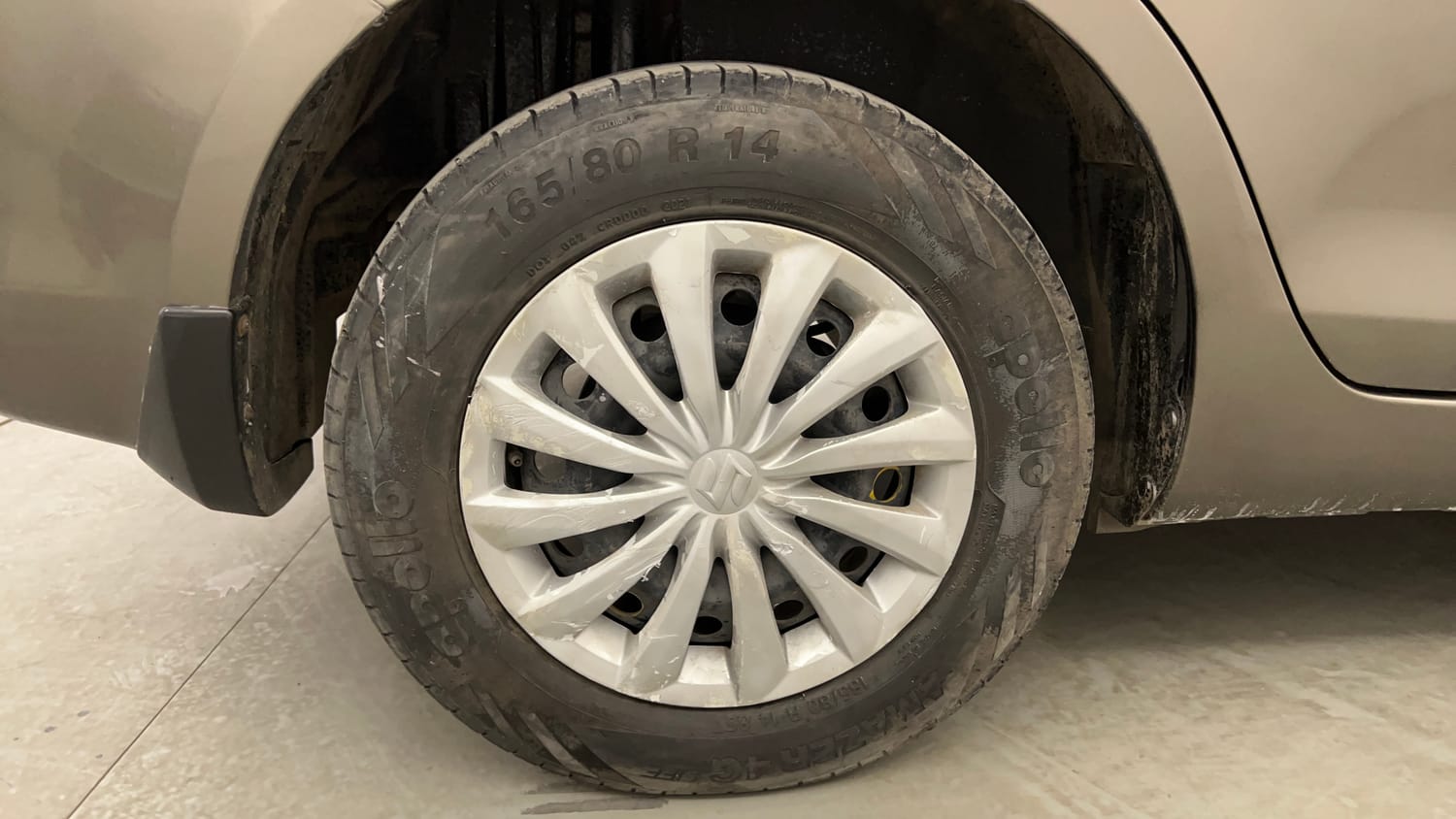 Used 2015 Maruti Suzuki Swift Dzire VXI Petrol Manual tyres RIGHT REAR TYRE RIM VIEW