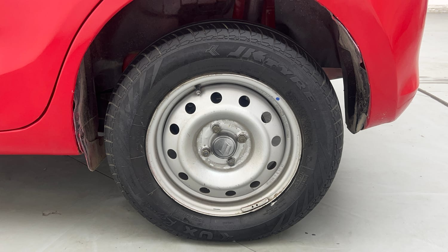 Used 2022 Maruti Suzuki Swift LXi Petrol Manual tyres LEFT REAR TYRE RIM VIEW