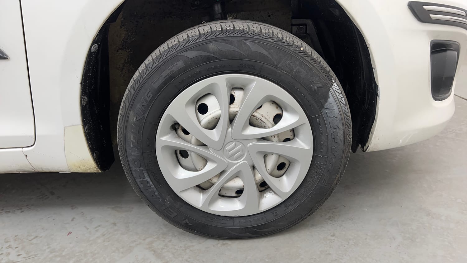 Used 2012 Maruti Suzuki Swift Dzire LXI Petrol Manual tyres RIGHT FRONT TYRE RIM VIEW