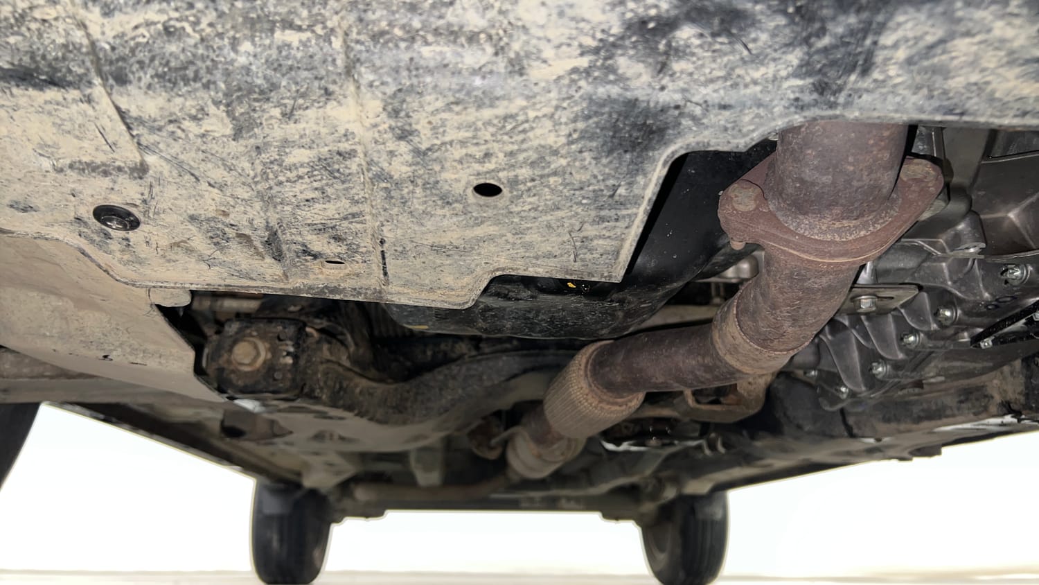Used 2023 Tata Nexon Fearless Plus S 1.2 Revotron Petrol 7DCA DT Petrol Automatic extra FRONT LEFT UNDERBODY VIEW