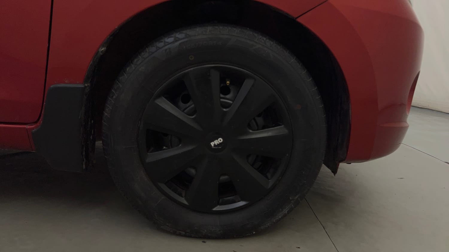 Used 2015 Maruti Suzuki Celerio VXi AMT Petrol Automatic tyres RIGHT FRONT TYRE RIM VIEW