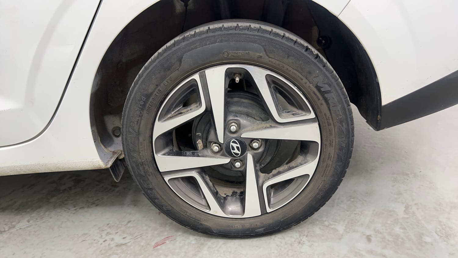 Used 2023 Hyundai Aura SX 1.2 CNG Cng Manual tyres LEFT REAR TYRE RIM VIEW