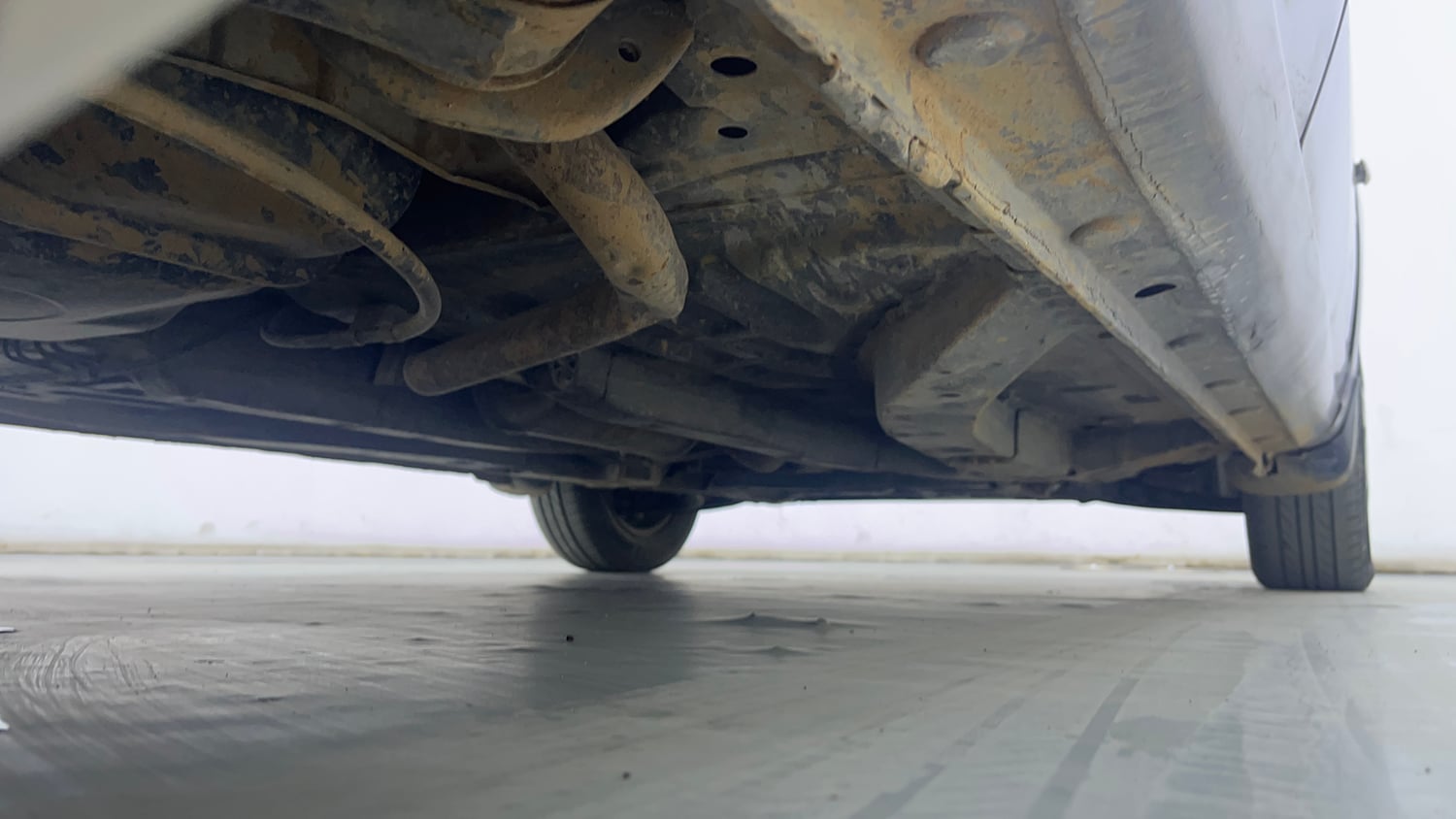 Used 2013 Honda Brio S(O)MT Petrol Manual extra REAR RIGHT UNDERBODY VIEW