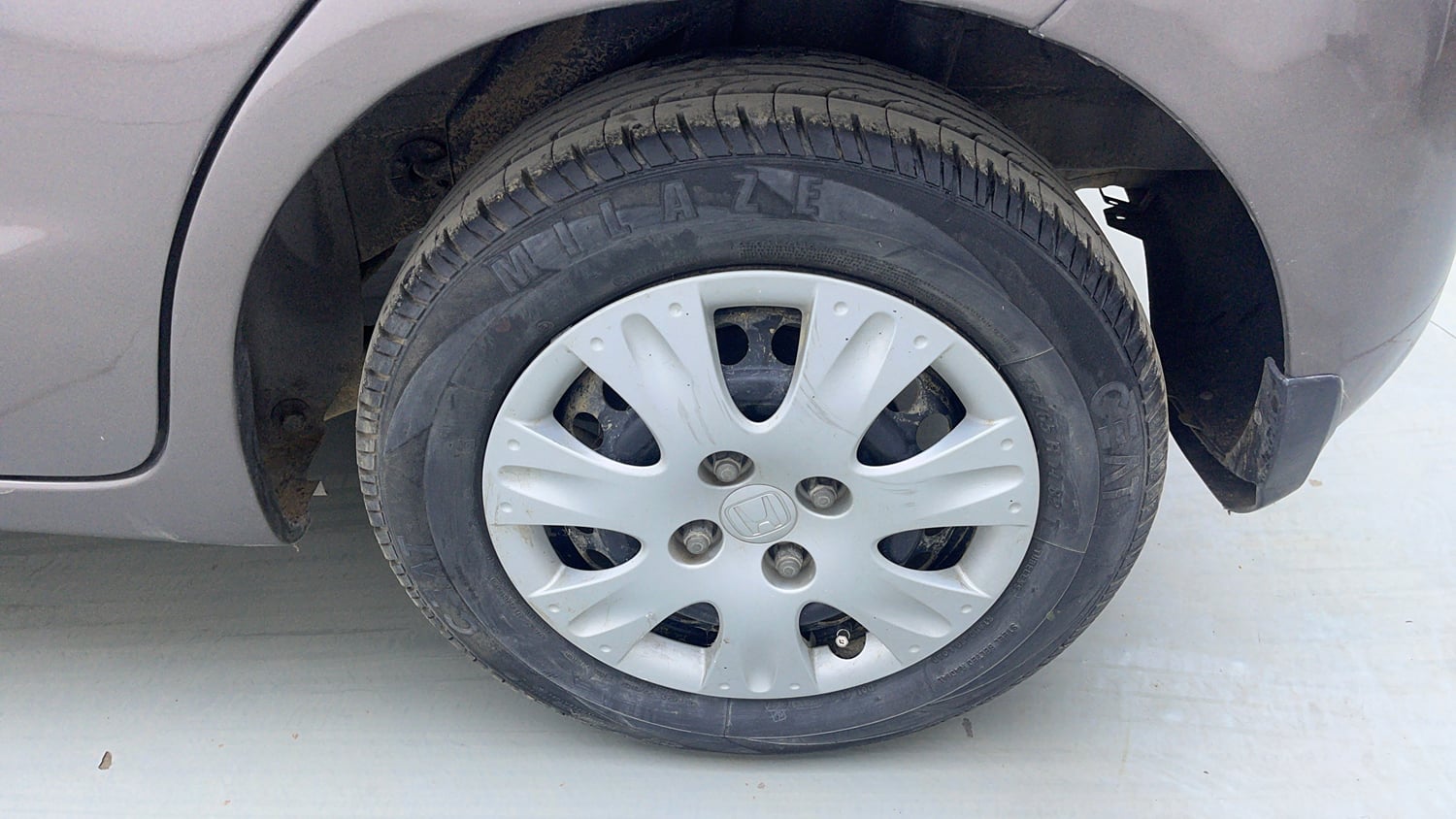 Used 2013 Honda Brio S(O)MT Petrol Manual tyres LEFT REAR TYRE RIM VIEW