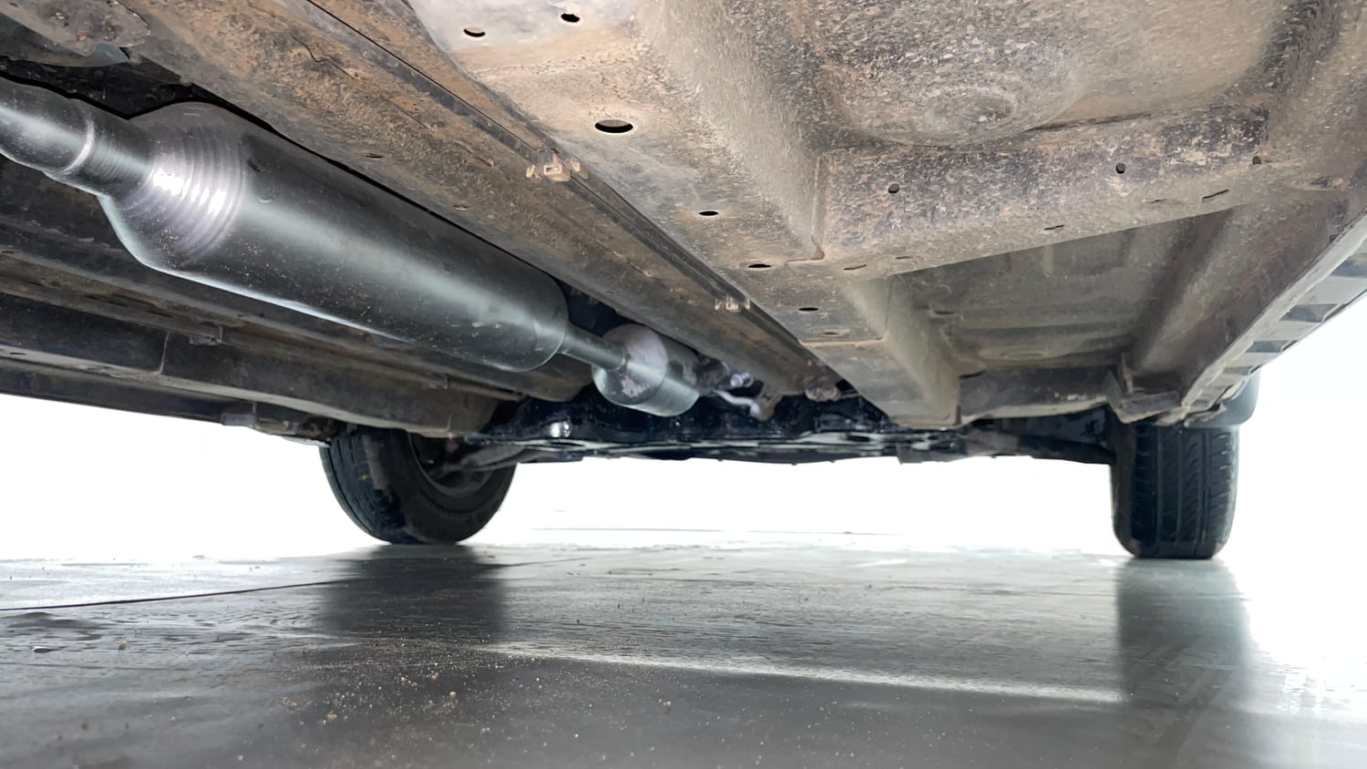 Used 2015 Maruti Suzuki Swift Dzire VXI Petrol Manual extra REAR RIGHT UNDERBODY VIEW