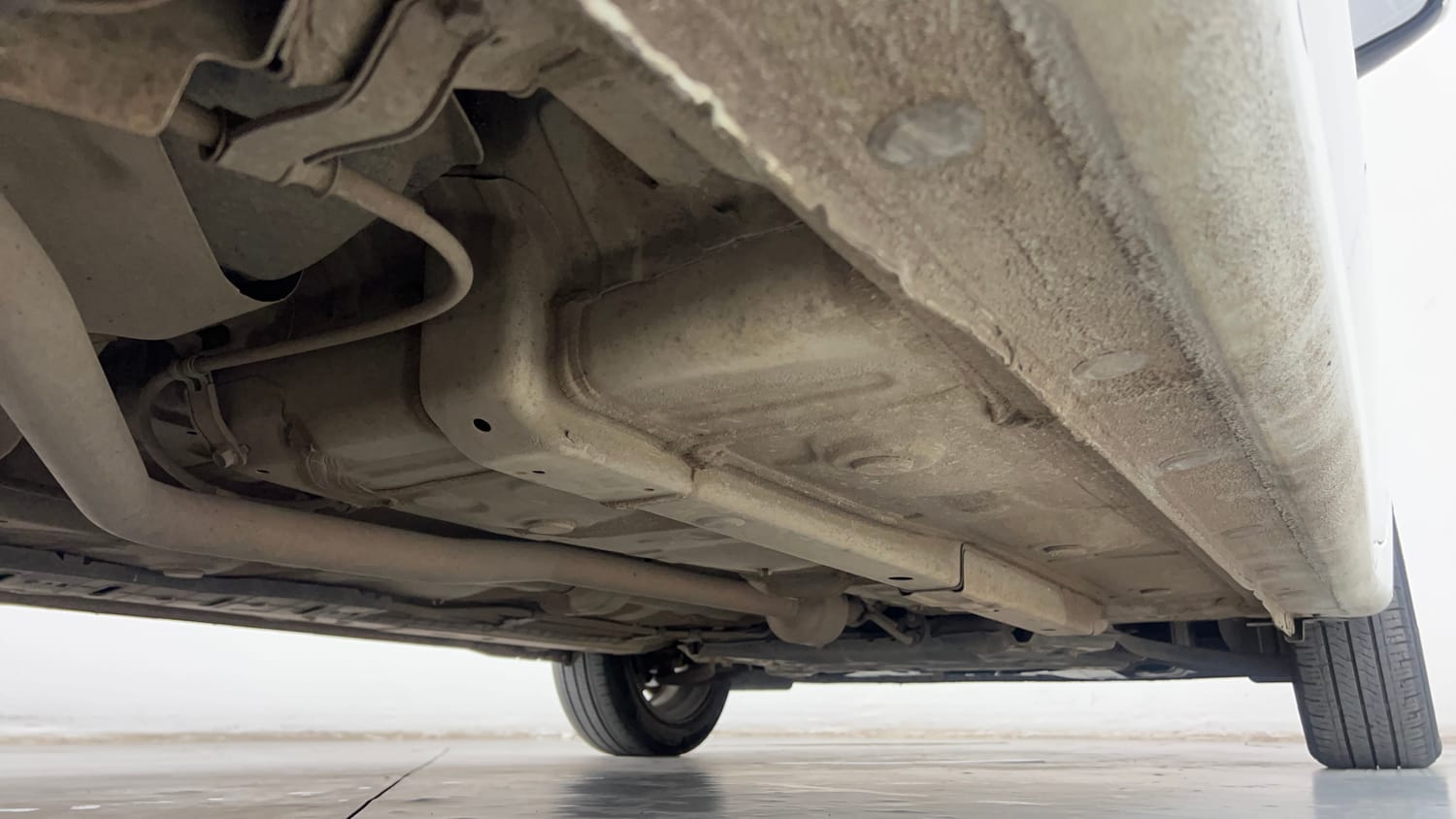 Used 2023 Hyundai Aura SX 1.2 CNG Cng Manual extra REAR RIGHT UNDERBODY VIEW