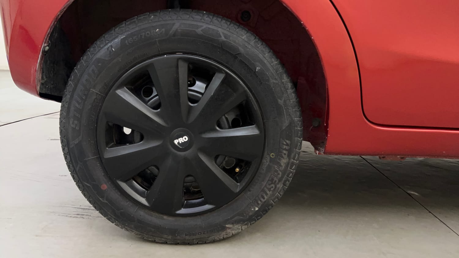 Used 2015 Maruti Suzuki Celerio VXi AMT Petrol Automatic tyres RIGHT REAR TYRE RIM VIEW