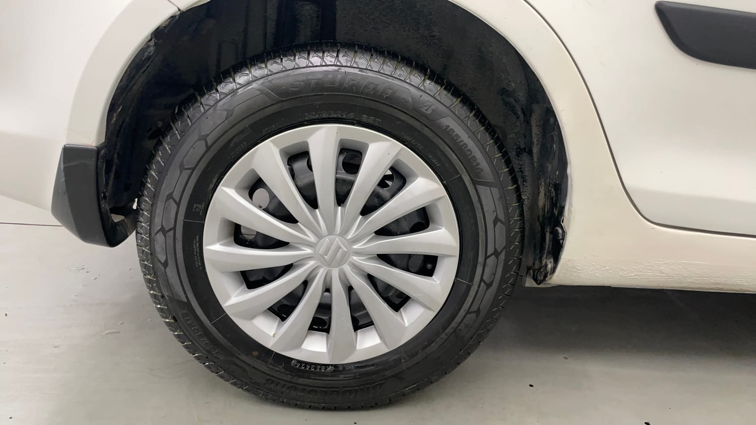 Used 2015 Maruti Suzuki Swift Dzire VXI Petrol Manual tyres RIGHT REAR TYRE RIM VIEW
