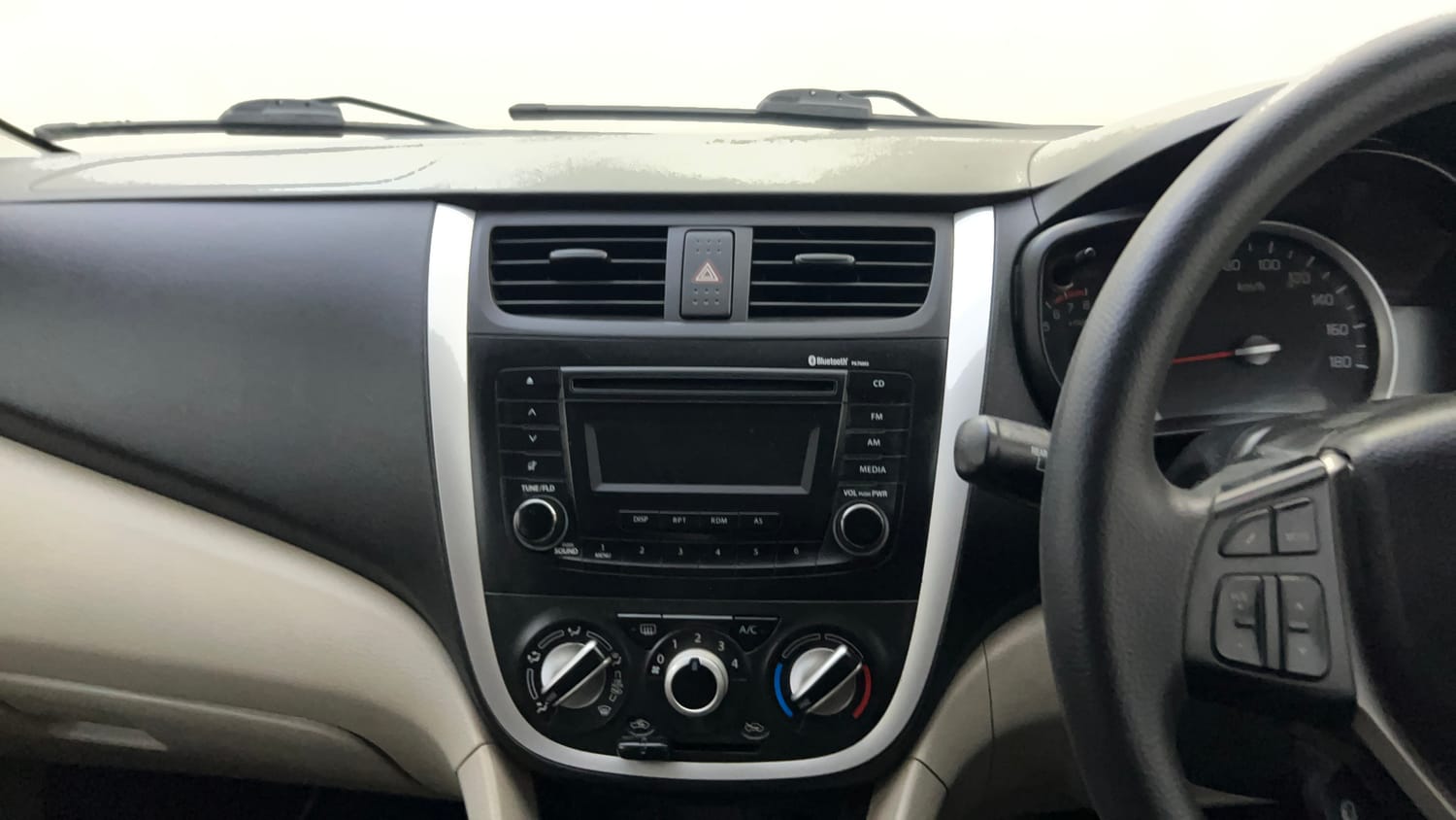 Used 2019 Maruti Suzuki Celerio ZXi Petrol Manual top_features Integrated (in-dash) music system