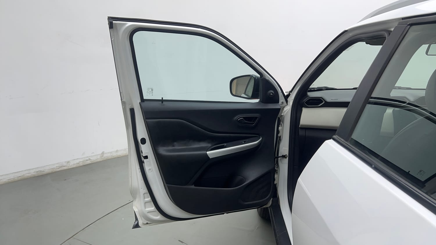 Used 2022 Nissan Magnite XE Petrol Manual interior LEFT FRONT DOOR OPEN VIEW
