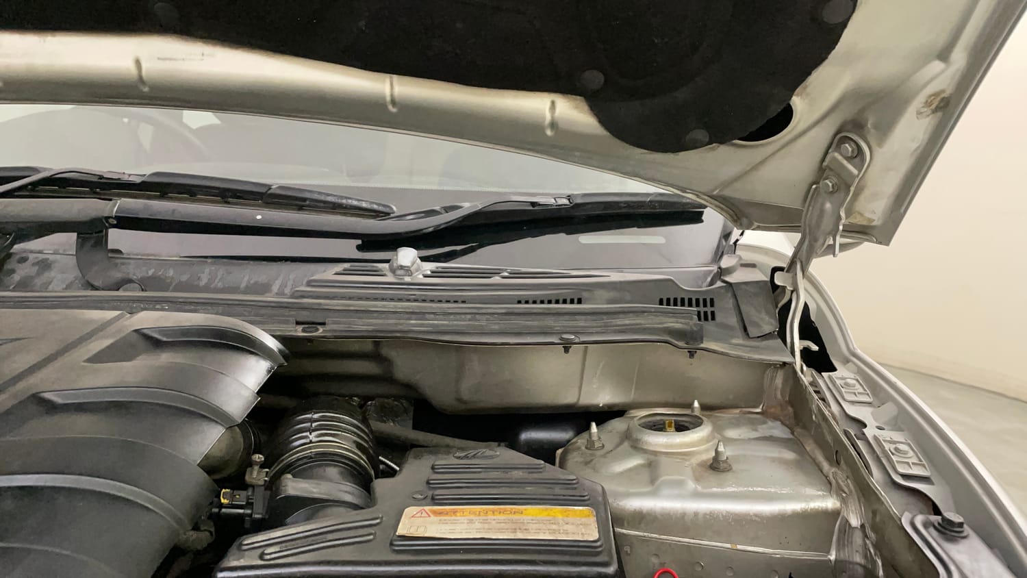 Used 2016 Mahindra XUV500 W4 Diesel Manual engine ENGINE LEFT SIDE HINGE & APRON VIEW
