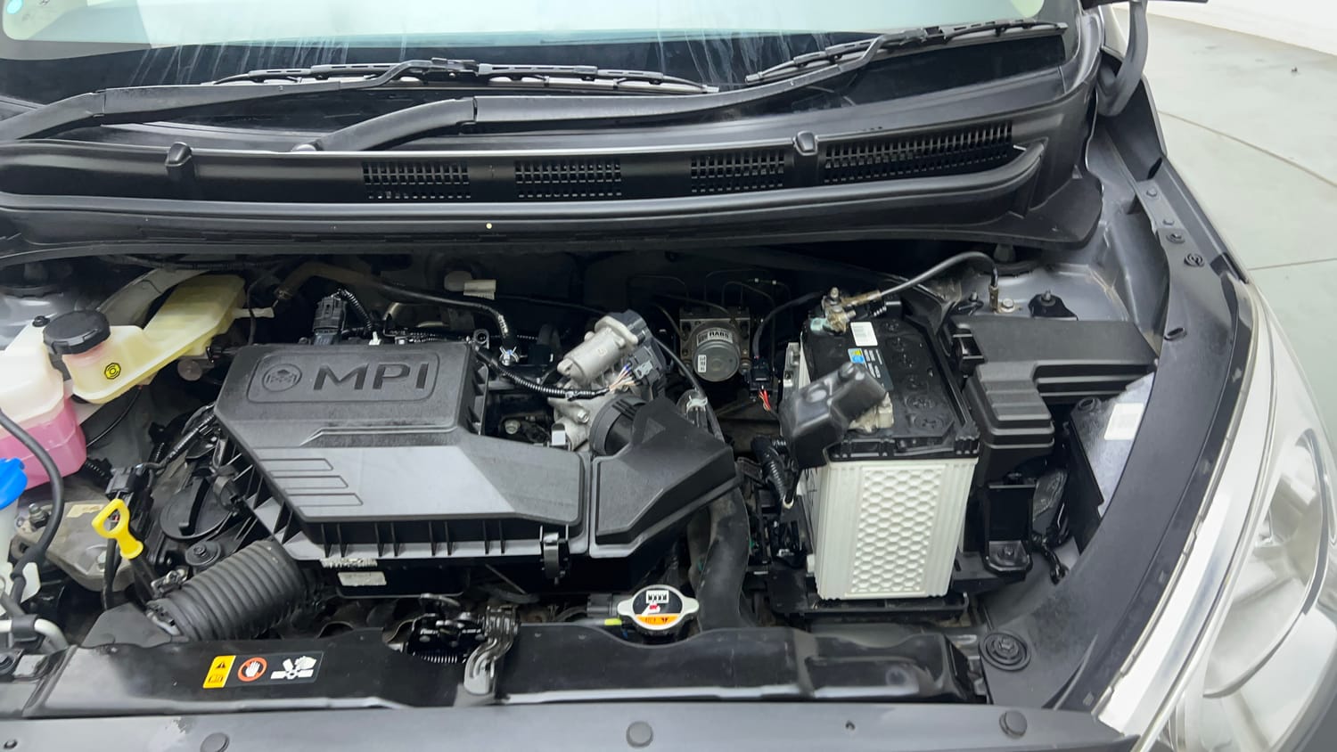 Used 2022 Hyundai Santro Sportz Petrol Manual engine ENGINE LEFT SIDE VIEW