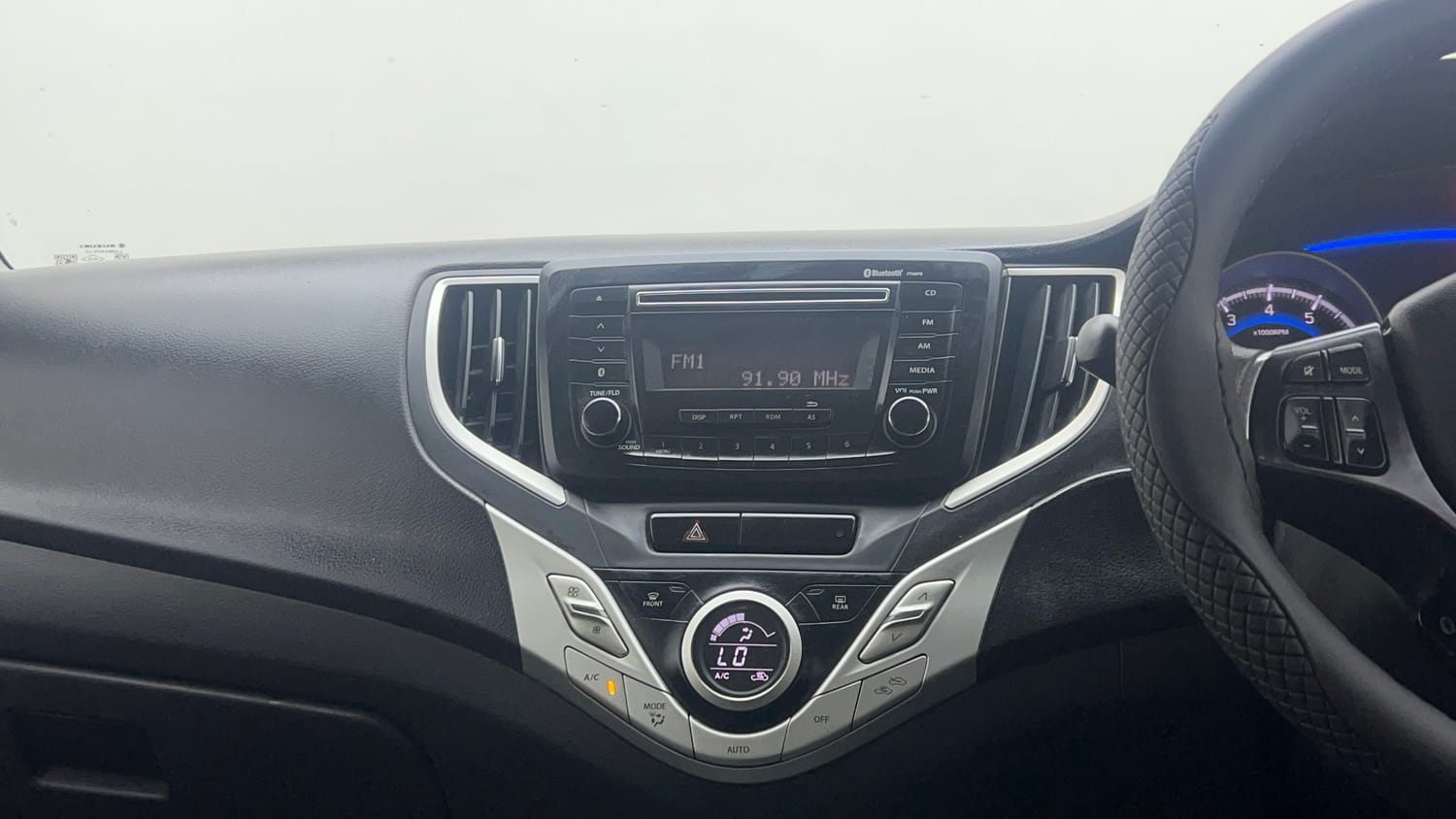 Used 2017 Maruti Suzuki Baleno Delta 1.2 Petrol Manual interior MUSIC SYSTEM & AC CONTROL VIEW