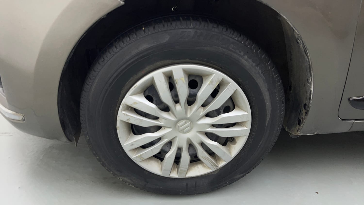 Used 2019 Maruti Suzuki Dzire VXi AMT Petrol Automatic tyres LEFT FRONT TYRE RIM VIEW