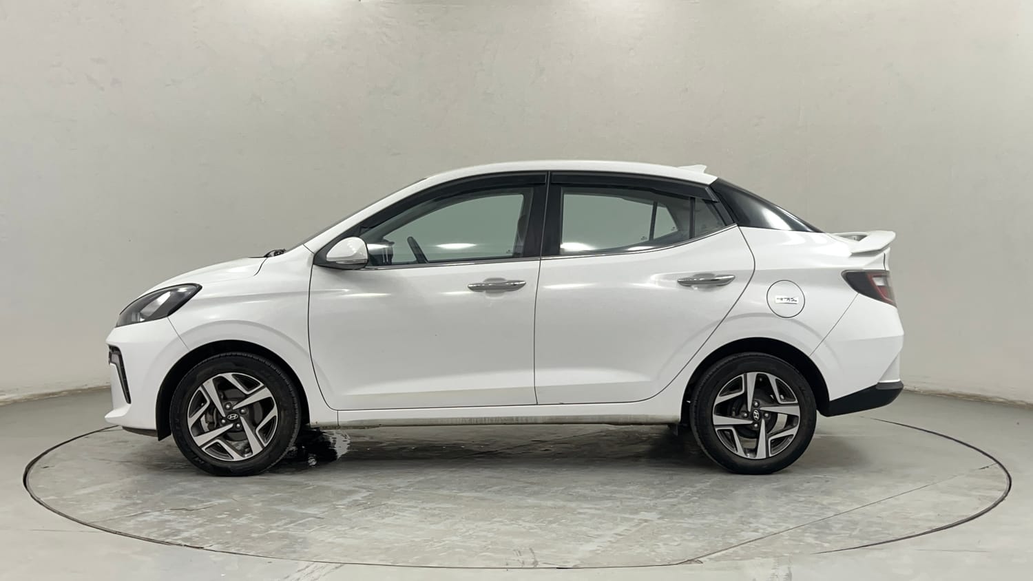 Used 2023 Hyundai Aura SX 1.2 CNG Cng Manual exterior LEFT SIDE VIEW